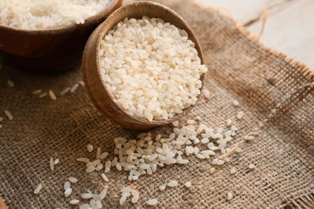 Bowl with rice on tableの写真素材