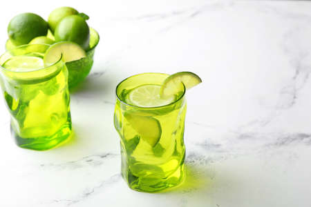 Fresh lime lemonade on table