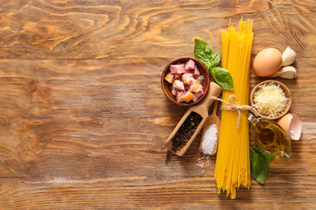 Ingredients for tasty pasta carbonara on tableの写真素材