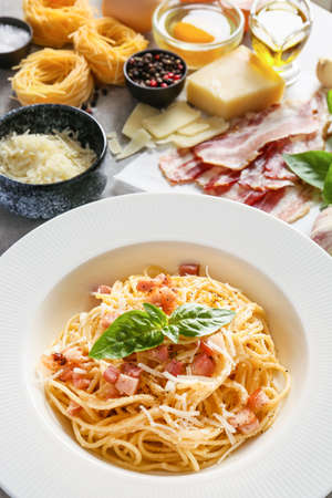 Plate with tasty pasta carbonara on table, closeupの写真素材
