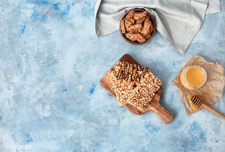 Crispy rice bars with honey on color backgroundの写真素材