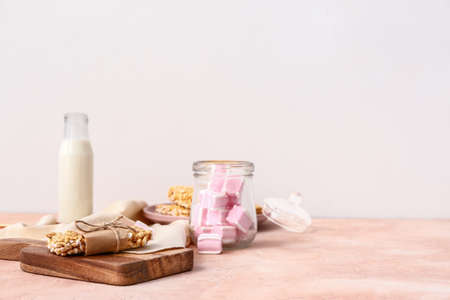 Board with crispy rice bar on tableの写真素材