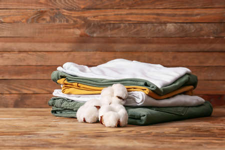 Cotton clothes on wooden backgroundの写真素材