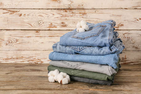 Cotton pants on wooden background