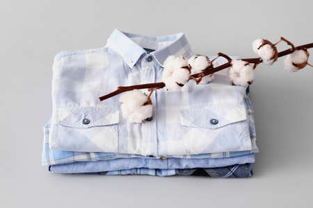 Cotton shirts on gray background
