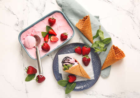 Tasty strawberry ice cream on white backgroundの写真素材