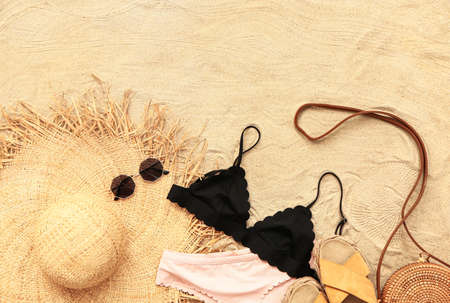 Beach accessories on sand backgroundの写真素材