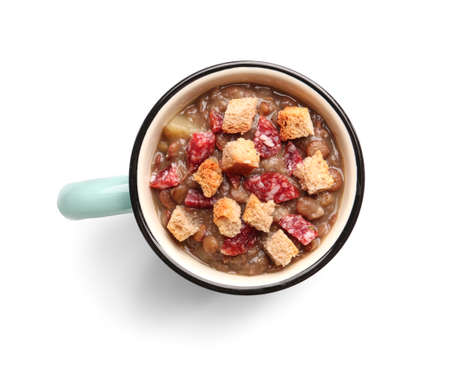 Cup of tasty lentils soup on white backgroundの写真素材