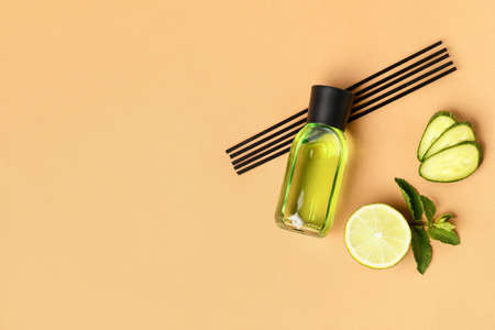 Composition with reed diffuser on color backgroundの写真素材