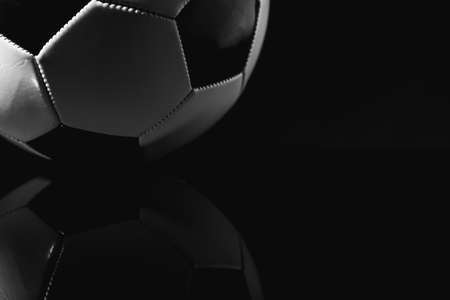 Soccer ball on dark backgroundの写真素材