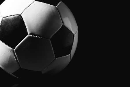 Soccer ball on dark backgroundの写真素材