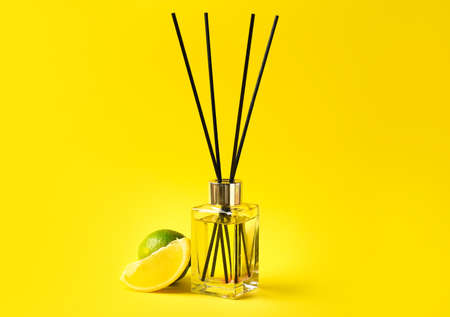 Citrus reed diffuser on color backgroundの写真素材