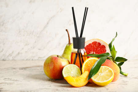 Fruit reed diffuser on table