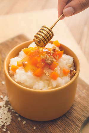 Preparing of tasty rice on table, closeupの写真素材