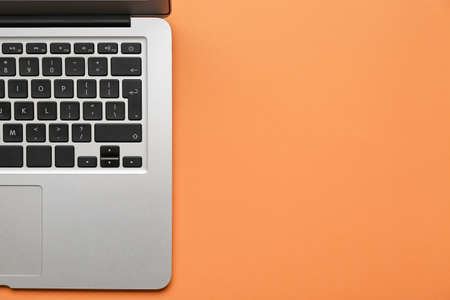 Modern laptop on color background, closeupの写真素材