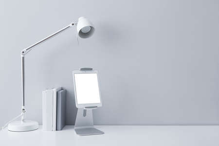 Modern tablet computer at workplace in officeの写真素材