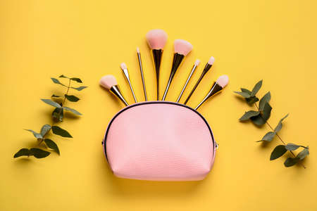 Composition with cosmetic bag on color backgroundの写真素材