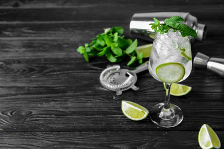 Glass of fresh mojito on tableの写真素材