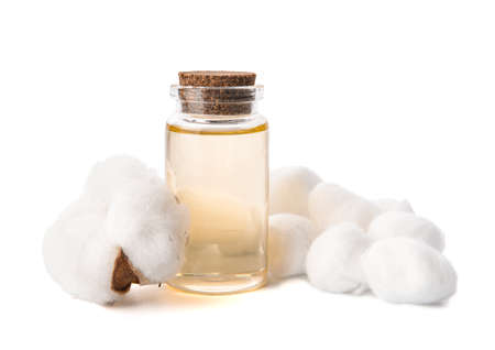 Cotton balls with essential oil on white backgroundの写真素材