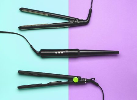 Set of hairdresser's devices on color backgroundの写真素材