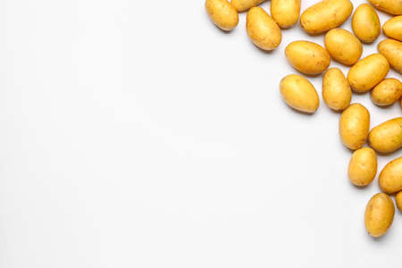 Raw potatoes on white backgroundの写真素材