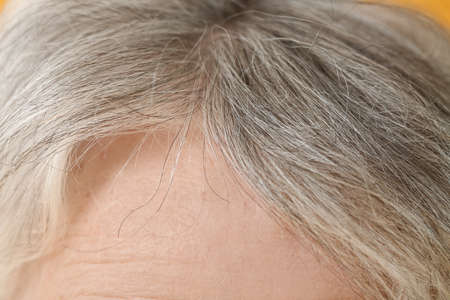Senior woman with gray hair, closeupの写真素材