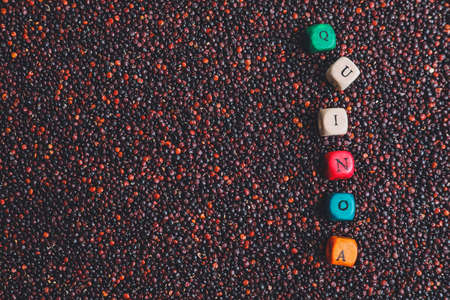 Cubes with word QUINOA and seeds, top viewの写真素材