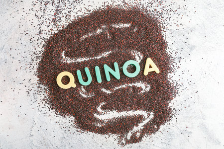 Word QUINOA with seeds on light backgroundの写真素材