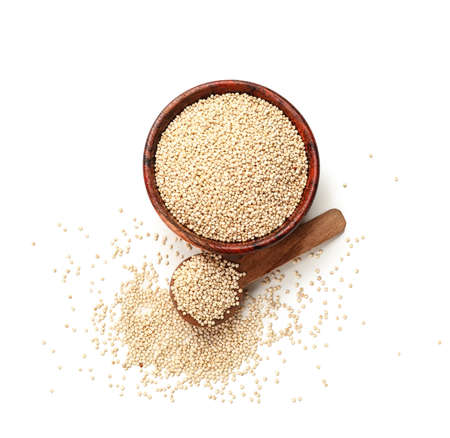 Bowl and spoon with healthy quinoa on white backgroundの写真素材