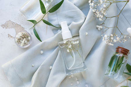 Natural air freshener and essential oil on tableの写真素材