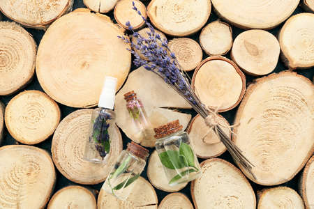 Natural air freshener and essential oil on wooden backgroundの写真素材