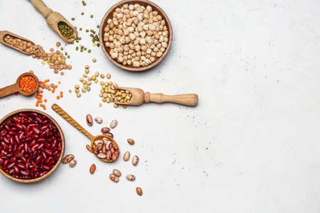 Different raw legumes on white backgroundの写真素材