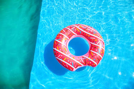 Inflatable ring in swimming poolの写真素材