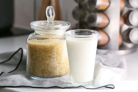 Glass of rice milk on tableの写真素材