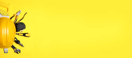 Set of construction tools on color background with space for textの写真素材