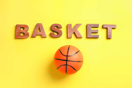 Ball for playing basketball game on color backgroundの写真素材