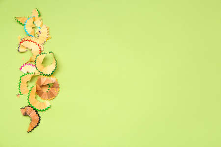 Pencil shavings on color background