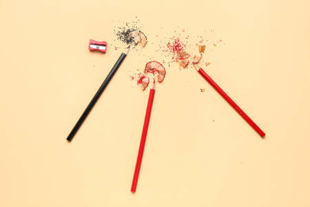 Pencils and shavings on color backgroundの写真素材