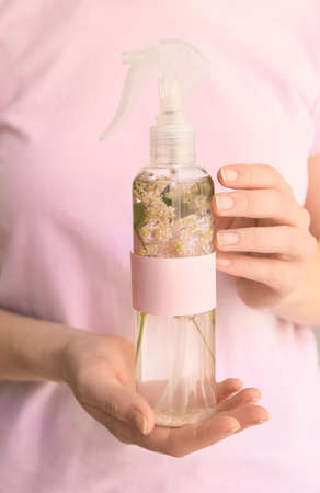 Woman with natural air freshener, closeup