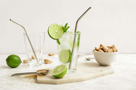 Glass of fresh mojito on tableの写真素材