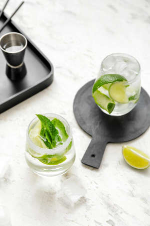 Glasses of fresh mojito on tableの写真素材