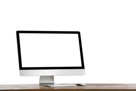 Modern PC monitor on table against white backgroundの写真素材