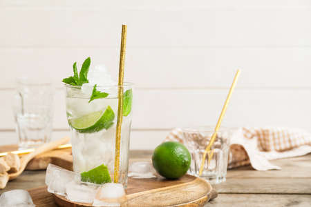 Glass of fresh mojito on tableの写真素材