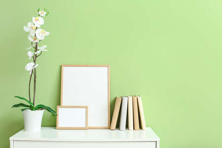 Modern chest of drawers near color wallの写真素材