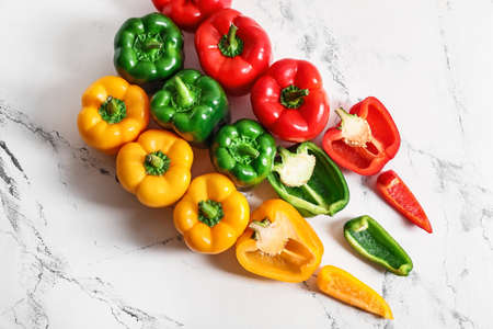 Set of fresh bell peppers on light backgroundの写真素材