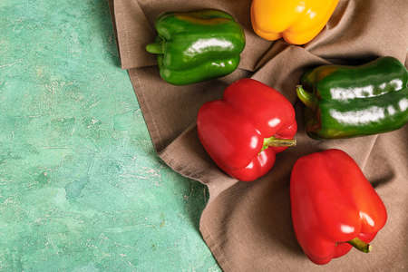 Fresh bell peppers on tableの写真素材