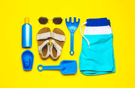 Set of beach accessories for children on color backgroundの写真素材