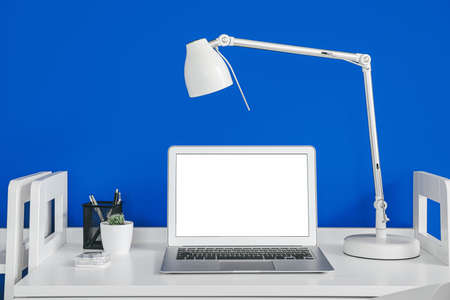 Comfortable workplace with modern computer in officeの写真素材