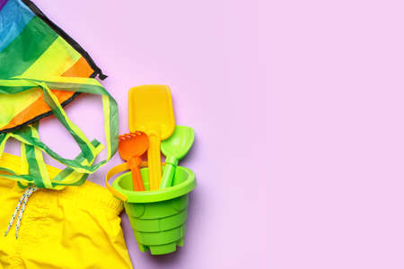 Set of beach accessories for children on color backgroundの写真素材