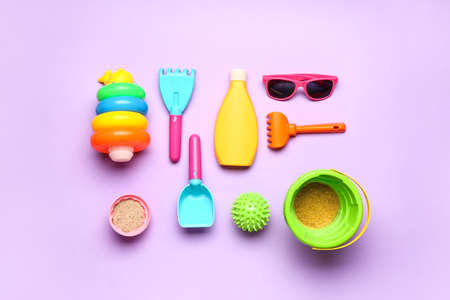 Set of beach accessories for children on color backgroundの写真素材